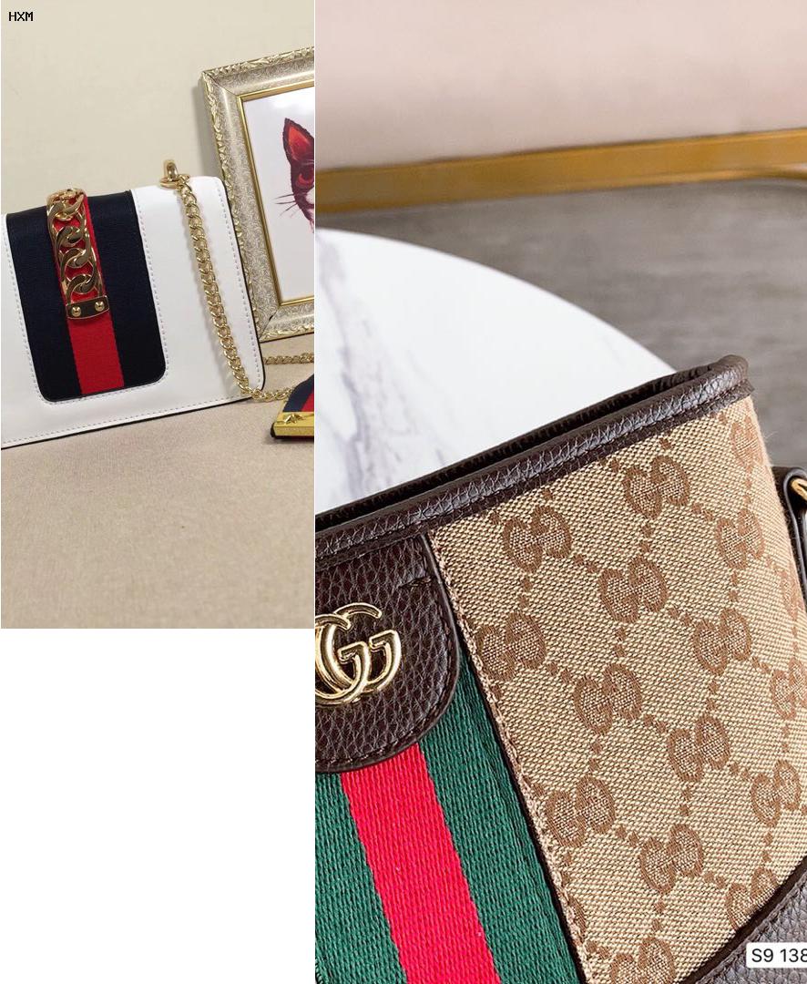 cintura gucci snake